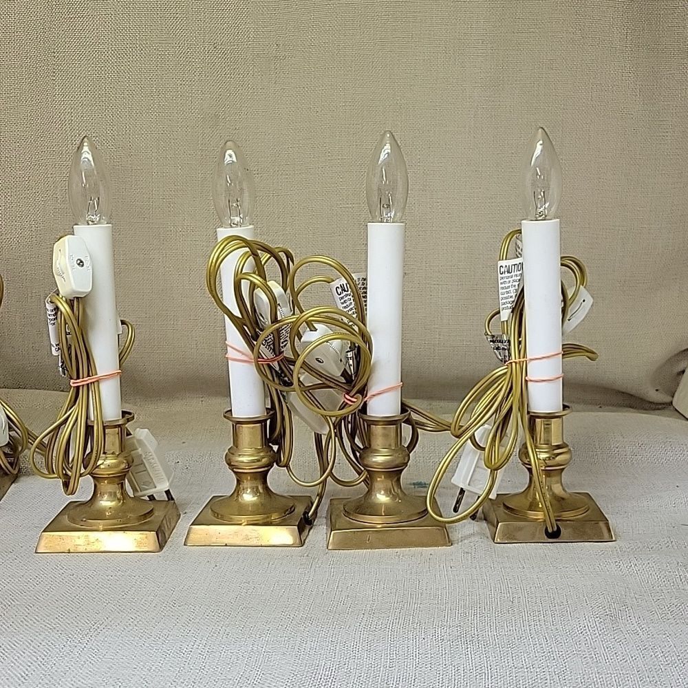 LOT OF 4 ELECTIC BRASS BASE 7” CANDELSTICKS WITH SWITCH AND BULBS. Set 2